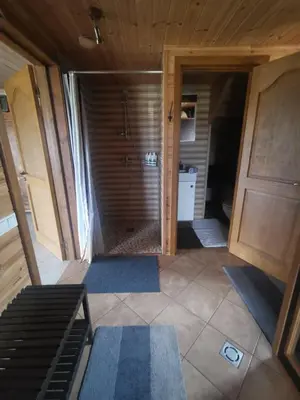 an empty room with a shower and a bathroom at Arturas Guest House in Vilnius