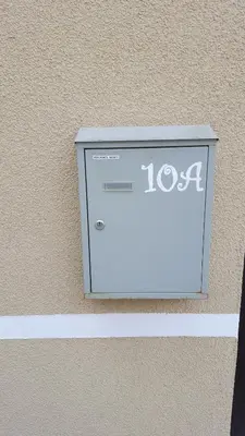 a metal box on the side of a building at Igo Apartment Townhall in Vilnius