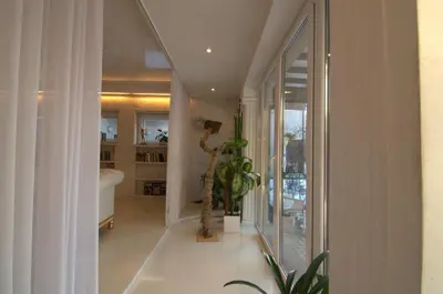 a hallway of a house with a staircase and a bathroom at Vilnius Luxury Apartment 3 in Vilnius