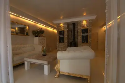a living room with a couch and a table at Vilnius Luxury Apartment 3 in Vilnius
