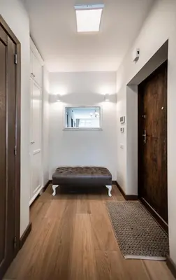a room with a bed and a window and a door at FoRest Apartments in Druskininkai