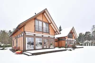 a rendering of a log house in the snow at Atostogų namelis Druskininkuose in Druskininkai