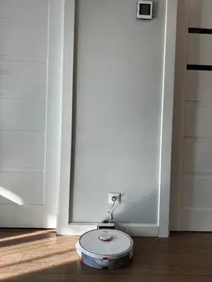 a scale sitting on the floor in front of a door at Your home - Spacious Apartment in City Center, with Balcony & Self Check-in in Vilnius