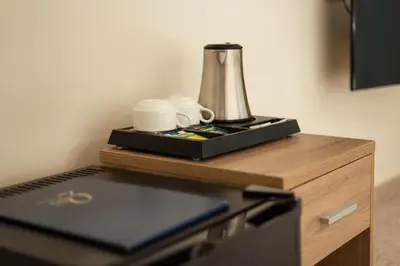 a counter with a blender on top of a desk at Old Town Trio in Vilnius
