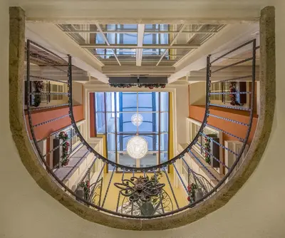 a view of a lobby with a large window at Kesminta Apartments in Vilnius
