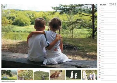 a calendar with a boy and a girl sitting on a bench at Kernavės centras in Kernavė