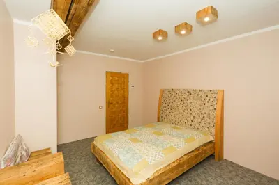 a bedroom with a bed in a room at Kernavės centras in Kernavė