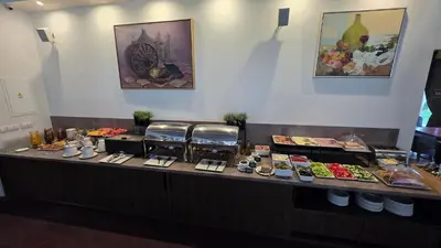 a buffet line with many different types of food at Regina in Druskininkai