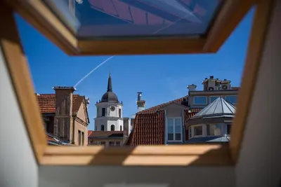 a view from a window of a city with buildings at Cathedral Sq. Apartment - Odminiu Str. in Vilnius