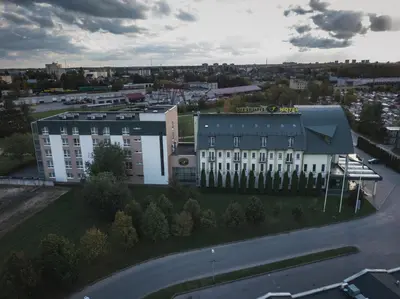 an aerial view of a building in a city at Šiauliu Krasto Medžiotojų Užeiga in Šiauliai