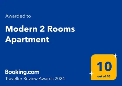 a yellow sign with the words modern rooms apartment at Modern 2 Rooms Apartment in Kaunas
