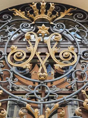 a close up of a clock on a building at Domus Maria in Vilnius