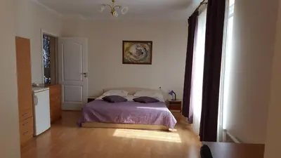 a bedroom with a bed with two pillows on it at Vijuandra in Zarasai