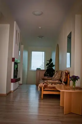 a living room with a couch and a table at Vijuandra in Zarasai