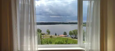 a window with a view of a lake at Vijuandra in Zarasai