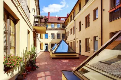 a view of a street with a glass building at #stayhere - Cozy & Comfy 1BDR Apartment Vilnius Old Town in Vilnius