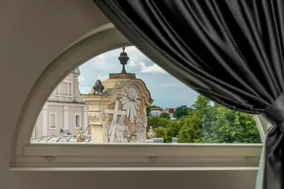 a view of a building through a window at St Palace Hotel in Vilnius