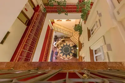 a view from the top of a staircase in a building at Artis Centrum Hotels in Vilnius