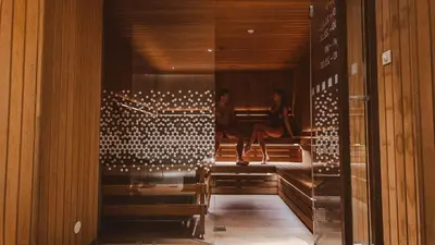 a hallway with a room filled with wine bottles at Radisson Blu Hotel Lietuva in Vilnius