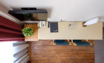 an overhead view of a room with a desk at Hotel Metropolis in Kaunas