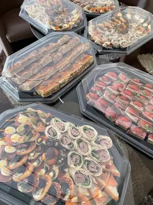 a bunch of trays of different types of seafood at Hotel Jerevan in Druskininkai