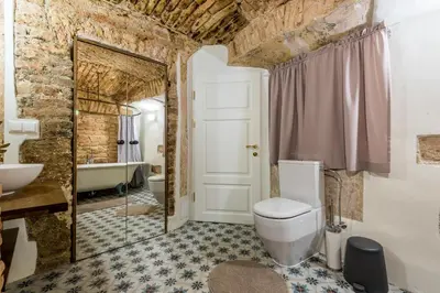 a bathroom with a toilet and a sink at Angel House Vilnius 29 in Vilnius