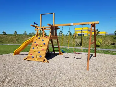 a playground with a slide and a climbing frame at Rezidencija Grįžulo ratai in Sasnava