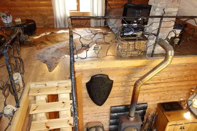 a view of a room with a wooden wall at Sveciu namelis in Šiauliai