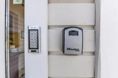 a door with a remote control attached to it at Dalija in Druskininkai