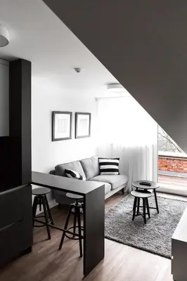 a living room with a couch and a table at Deluxe Apartments by Hostlovers in Kaunas