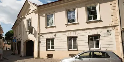 a car parked in front of a building at Cozy Apt in the Heart of Old Town in Vilnius