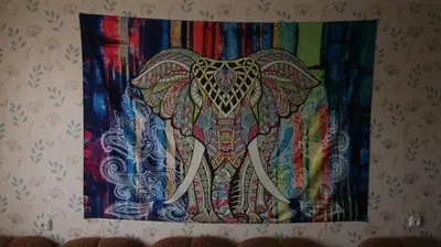 a painting of an elephant hanging on a wall at Nature lovers place in Varėna