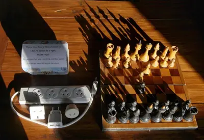 a chess board and a box on a table at Vokiečių g. in Vilnius