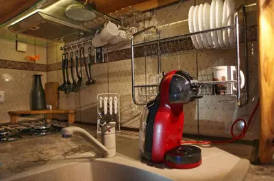 a kitchen counter with a red mixer on the sink at Vokiečių g. in Vilnius