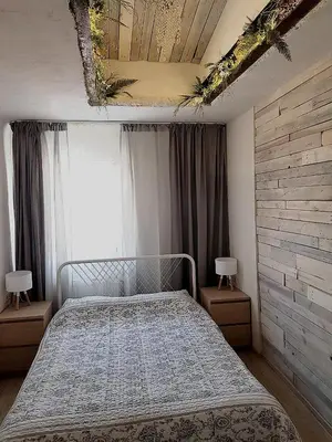 a bedroom with a bed and a window at Dp Art 14 OLD TOWN Self check in in Kaunas