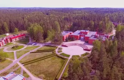 an aerial view of a building in a park at Visagino parkas in Visaginas