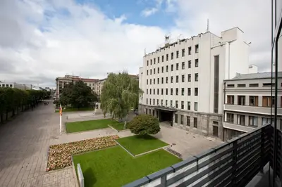 a view from the balcony of a building with a garden at Kaunas City in Kaunas
