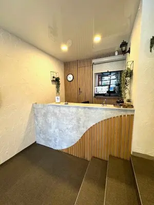 a kitchen with a large counter in a room at Savan House 