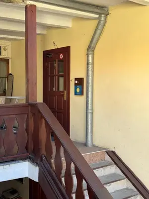 a staircase leading to the door of a house at Tilto 6 in Vilnius
