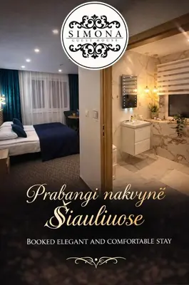 a bedroom with a bed and a sink in a room at Simona House in Šiauliai