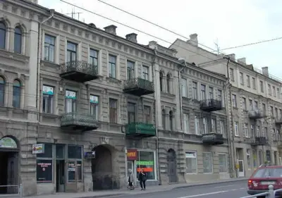 a large building on the side of a street at Natalex Europe in Vilnius