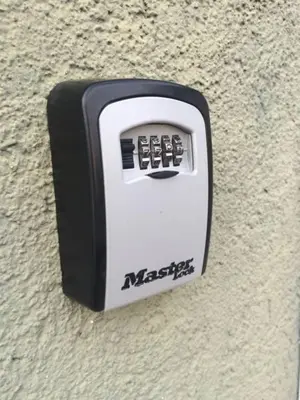 a black and white socket on the side of a wall at Cozy Garden Free parking in Vilnius