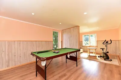 a room with a pool table in it at 