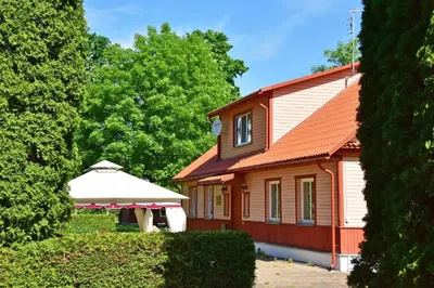 a house with a white tent in front of it at 