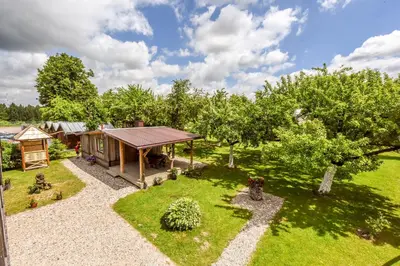 an overhead view of a garden with a cabin at Rasos sodyba in Prienai