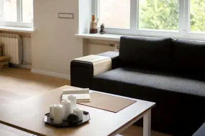 a living room with a couch and a coffee table at #stayhere 3BDR Modern & Stylish Apartment - Heart of Old Town by Houseys in Vilnius