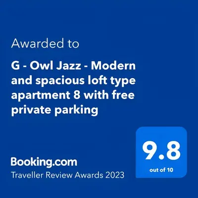 a screenshot of a phone with the text awarded to owl jazz modern and spontaneous at Modern and spacious loft type apartment 8 with free private parking by 