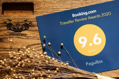 a sign for a ticket for a traveling review awards at Pagulbis - Tavo namai in Klabiniai
