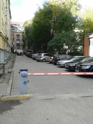 a parking lot with a fire hydrant on a street at Jolando Apartment in Kaunas