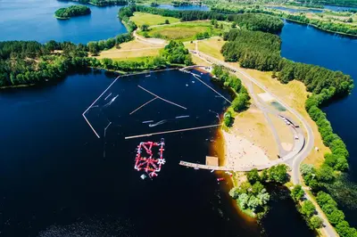 an aerial view of an island in a lake at Vasarnamis Zarasuose in Zarasai